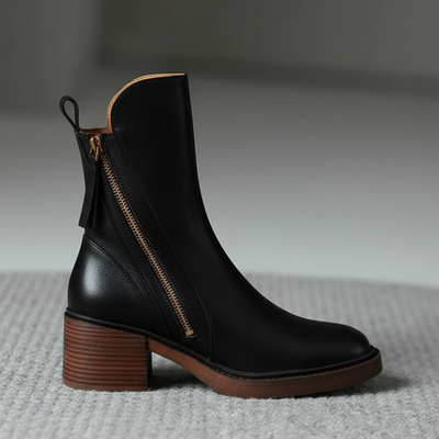 Valorine™ | Black leather boot with a comfortable heel, elegant and timeless